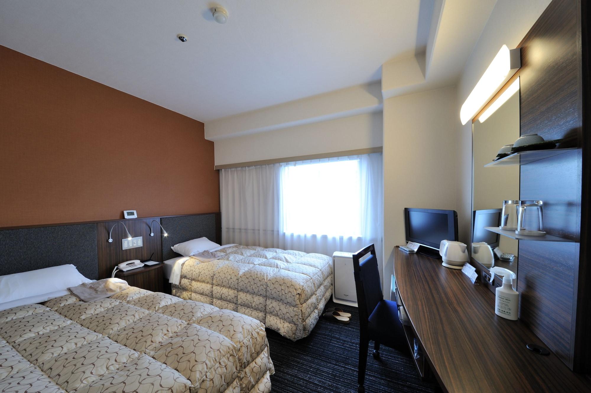 Toyama Manten Hotel Bagian luar foto
