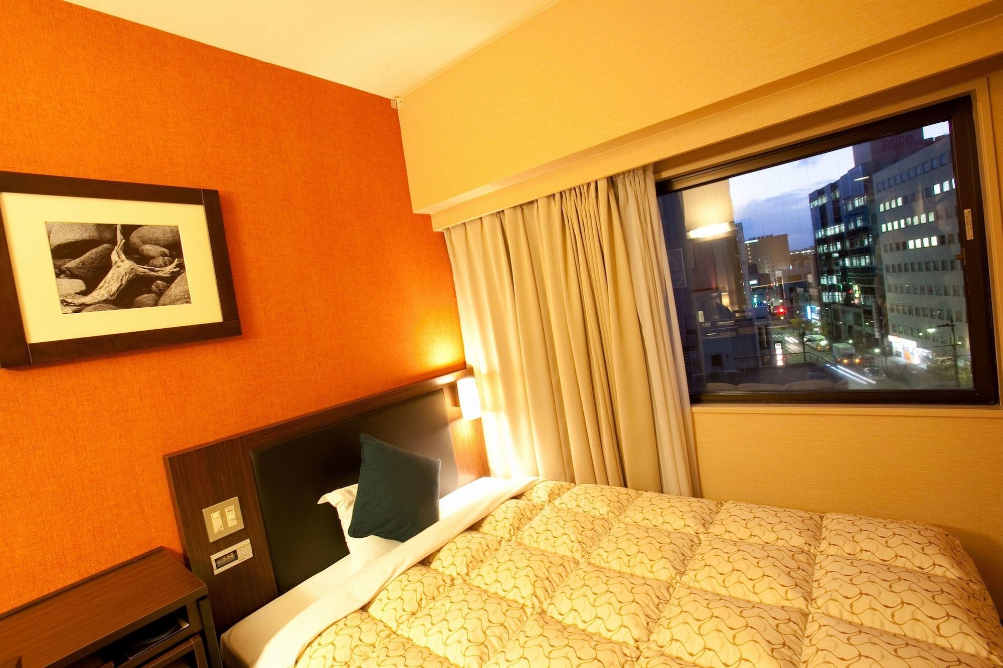 Toyama Manten Hotel Bagian luar foto