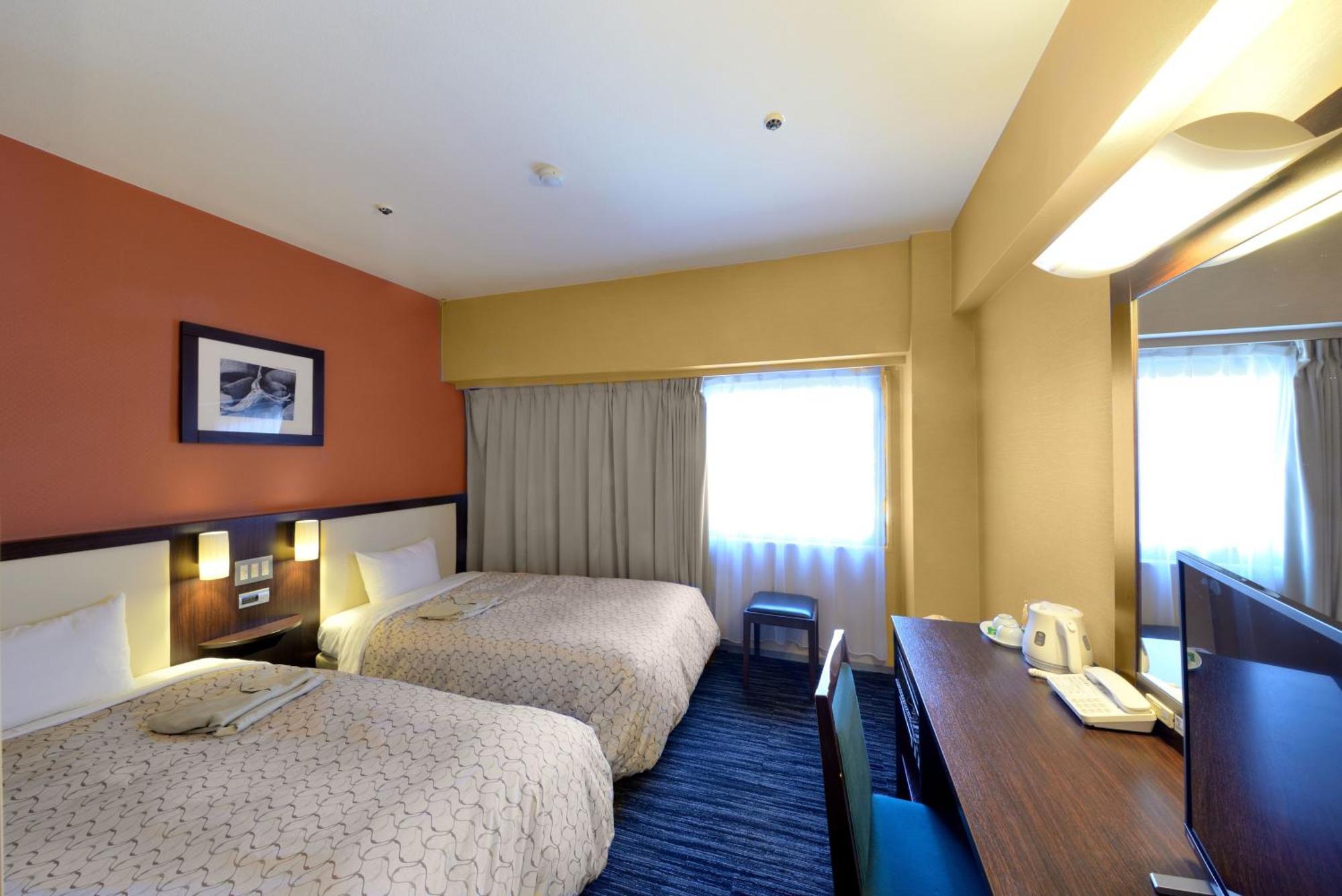 Toyama Manten Hotel Bagian luar foto