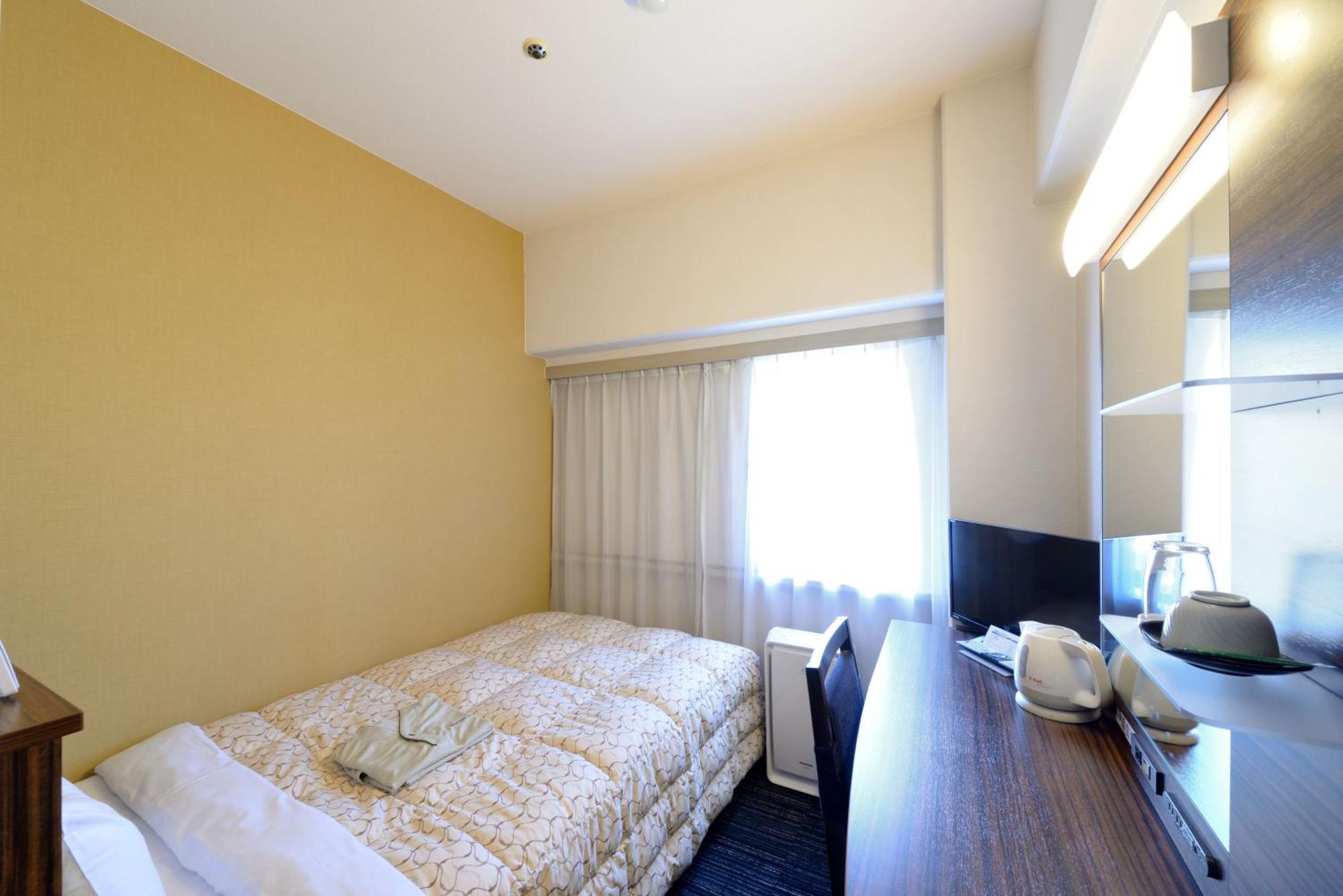 Toyama Manten Hotel Bagian luar foto