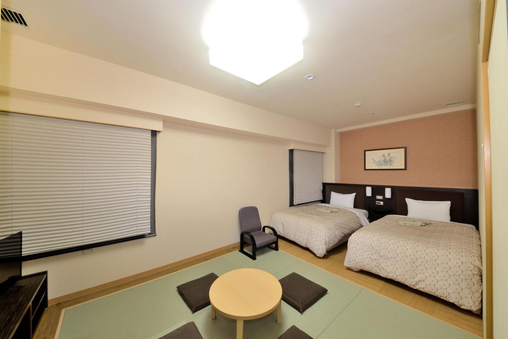 Toyama Manten Hotel Bagian luar foto